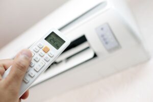 Residential Air Conditioning in Pompano Beach, FL with remote controller