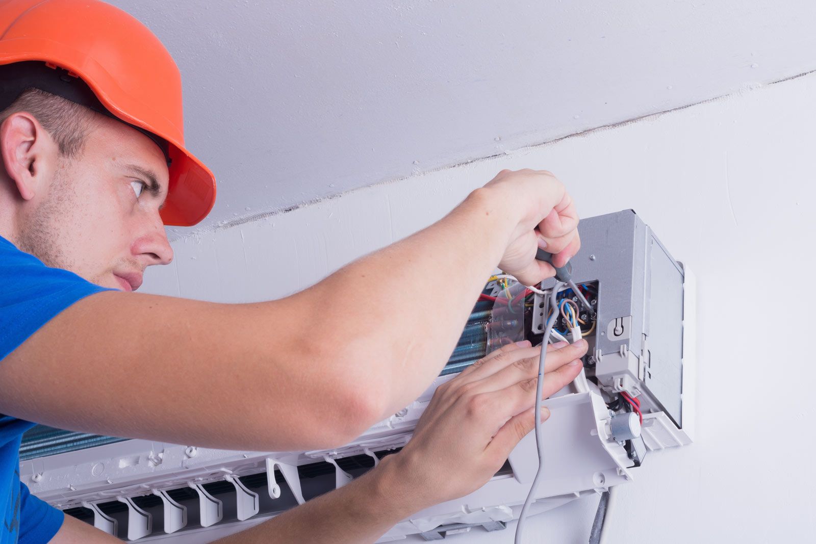 Technician fixing a Commercial Air Conditioning in Delray Beach